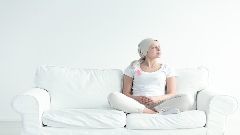 Woman,With,Cancer,Wearing,A,Pink,Ribbon,Feeling,Hopeful